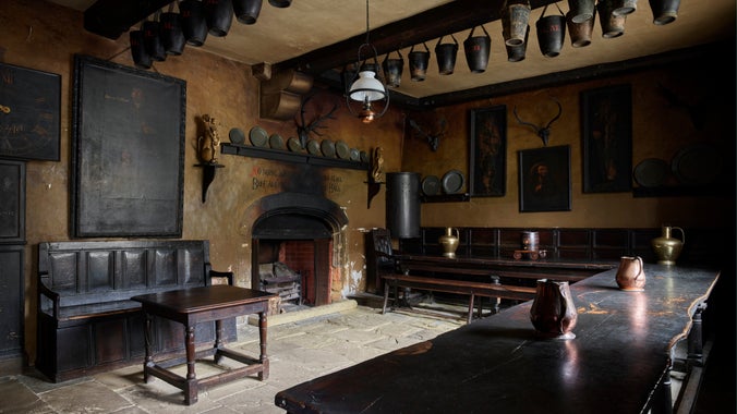 The Servants' Hall containing a table which is made from one continuous piece of oak, at Chirk Castle, Wrexham